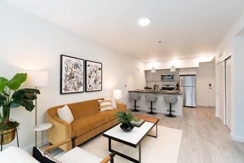 Henley Place Apartments in Milwaukie, Oregon Model Living Room and Kitchen